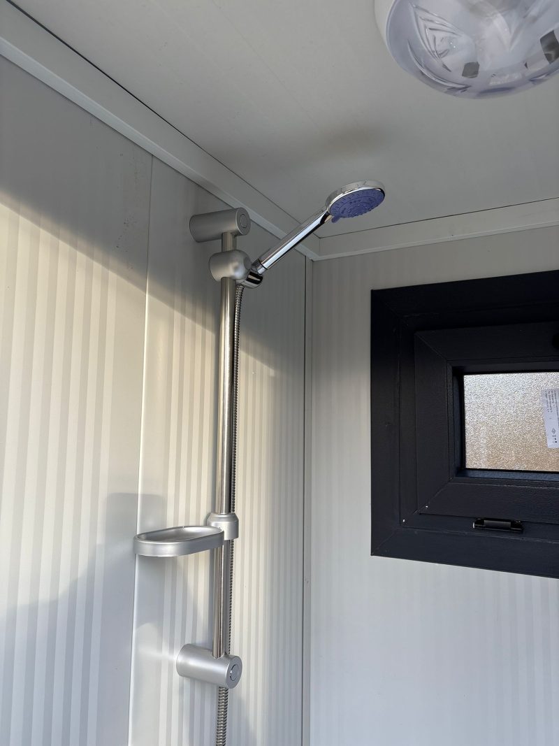 Douchekop toilet en douche unit