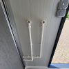 Aansluitingen boiler voor een mobiele douchecabine
