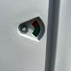 Groen/rood slot van een dixi toiletcabine