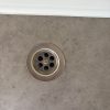 Vloerput in een mooie badkamer unit