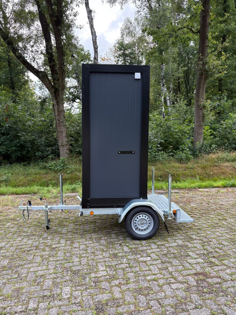 Zijaanzicht douchewagen