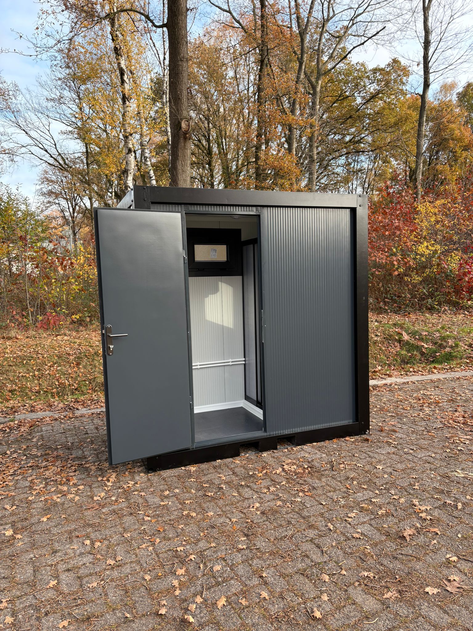 Douche unit met omkleedruimte buitenzijde Deur open douche unit met omkleedruimte